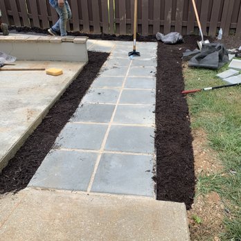 Carlos Landscaping - a man working on a patio - Snow Removal Near Me - Alexandria, Virginia Carlos Landscaping - a man working on a patio - Snow Removal Near Me - Alexandria, Virginia