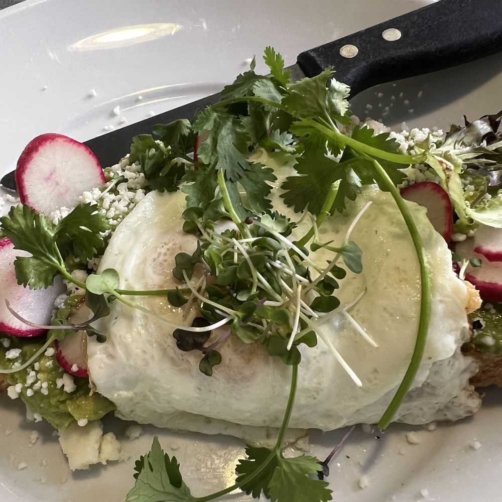 La Mo Cafe - Guacamole toast w/egg - Breakfast & Brunch Near Me - Turlock, California La Mo Cafe - Guacamole toast w/egg - Breakfast & Brunch Near Me - Turlock, California