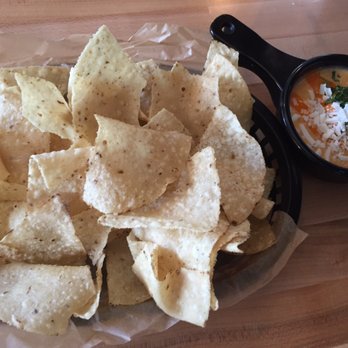 Torchy's Tacos - GREEN CHILE QUESO & CHIPS. A MUST GET! - Tex-Mex Near Me - Austin, Texas Torchy's Tacos - GREEN CHILE QUESO & CHIPS. A MUST GET! - Tex-Mex Near Me - Austin, Texas