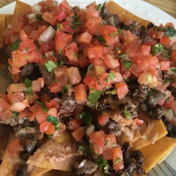 Las Pupusas - Steak nachos with creama on the side - Mexican Near Me - Las Vegas, Nevada Las Pupusas - Steak nachos with creama on the side - Mexican Near Me - Las Vegas, Nevada