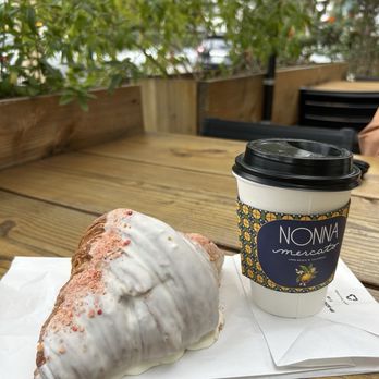 Nonna Mercato - My Strawberry Cream Croissant and a cup of brewed coffee, sitting out on the patio with a heat lamp :) - Bakeries Near Me - Long Beach, California