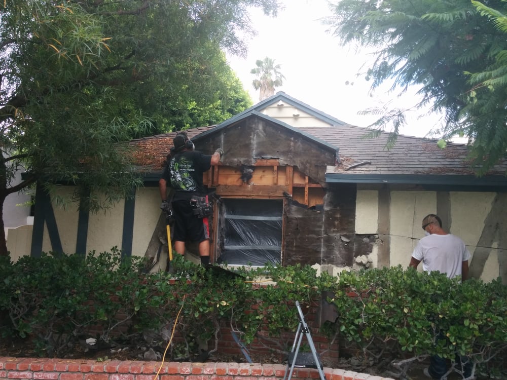 Slide of Mike's Roofing & Building