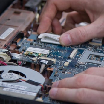 Mission Repair Centre - MRC Technician is working on motherboard of a laptop - Data Recovery Near Me - Winnipeg, Manitoba Mission Repair Centre - MRC Technician is working on motherboard of a laptop - Data Recovery Near Me - Winnipeg, Manitoba