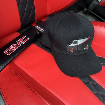 Crest Advanced Dry Cleaners - Black hat with van patch on black and red racing seat - Carpet Cleaning Near Me - Gaithersburg, Maryland Crest Advanced Dry Cleaners - Black hat with van patch on black and red racing seat - Carpet Cleaning Near Me - Gaithersburg, Maryland