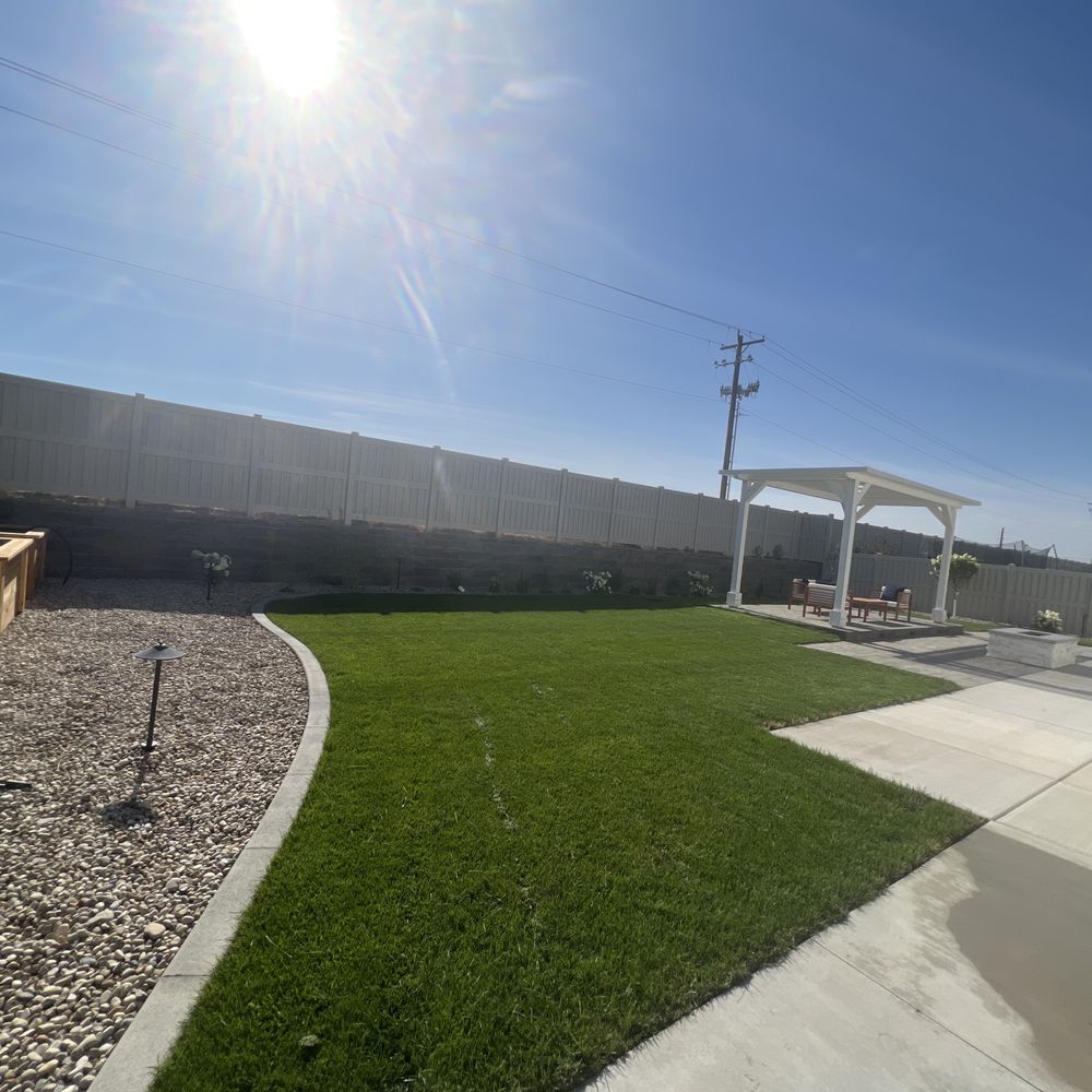 Schaefer Butte Landscaping and Patios - The grass, plants, trees and border complete the landscape along with the up lighting for the trees and down lighting for the plants. - Landscaping Near Me Schaefer Butte Landscaping and Patios - The grass, plants, trees and border complete the landscape along with the up lighting for the trees and down lighting for the plants. - Landscaping Near Me