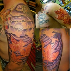 Waynes Tattoo World - Custom chest and sleeve by Wayne Morel