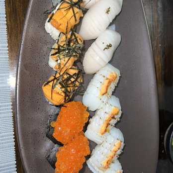 312 Fish Market - Uni, Ikura (salmon roe), HAWAIIAN WALU (white tuna), and Ika (squid) nigiris - Sushi Bars Near Me - Chicago, Illinois