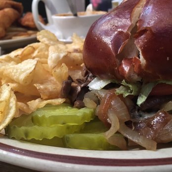 Hilltop Pub and Grill - Mushroom Mushroom & Swiss 1/2lb burger on a pretzel bun - Pubs Near Me - Stevens Point, Wisconsin Hilltop Pub and Grill - Mushroom Mushroom & Swiss 1/2lb burger on a pretzel bun - Pubs Near Me - Stevens Point, Wisconsin