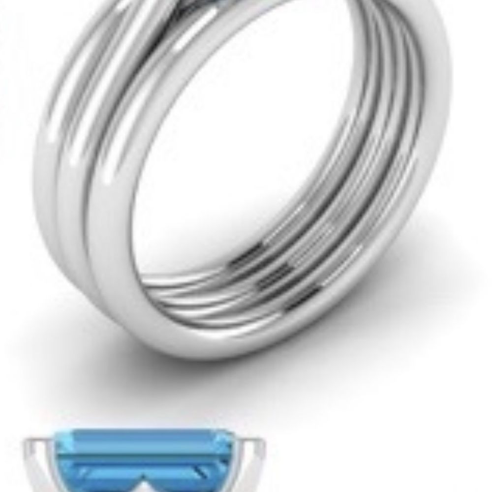 My engagement ring and wedding bands.