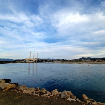 Morro Bay Rock - Looking from the Rock across the bay to the stacks of the power plant - Beaches Near Me - Morro Bay, California Morro Bay Rock - Looking from the Rock across the bay to the stacks of the power plant - Beaches Near Me - Morro Bay, California