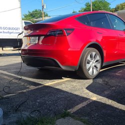 Avis Car Rental - AVIS Tesla Charging Station