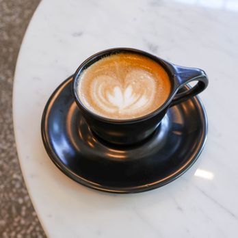 Deville Coffee - a cup of coffee on a saucer - Coffee & Tea Near Me - Vancouver, British Columbia Deville Coffee - a cup of coffee on a saucer - Coffee & Tea Near Me - Vancouver, British Columbia