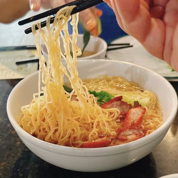 Ming's Bistro - a bowl of noodles with chopsticks - Dim Sum Near Me - Orlando, Florida Ming's Bistro - a bowl of noodles with chopsticks - Dim Sum Near Me - Orlando, Florida