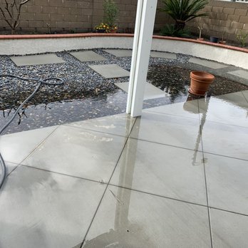 Patios by B and B - Standing water waiting to drain out in to very inadequate drain system. - Patio Coverings Near Me - Tustin, California