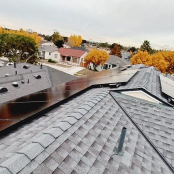 Sunrise Energy Group - a view of a rooftop with solar panels - Solar Installation Near Me - Los Angeles, California Sunrise Energy Group - a view of a rooftop with solar panels - Solar Installation Near Me - Los Angeles, California