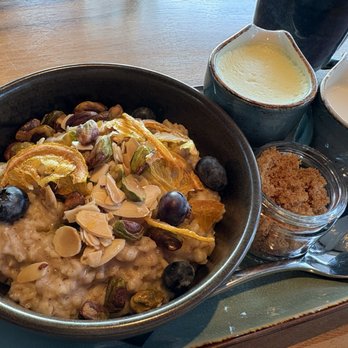 LURE Restaurant & Bar - Oats and honey - oatmeal with fresh and dried fruit and nuts. I asked for a side of brown sugar and milk. Delicious!! - Seafood Near Me - Victoria, British Columbia