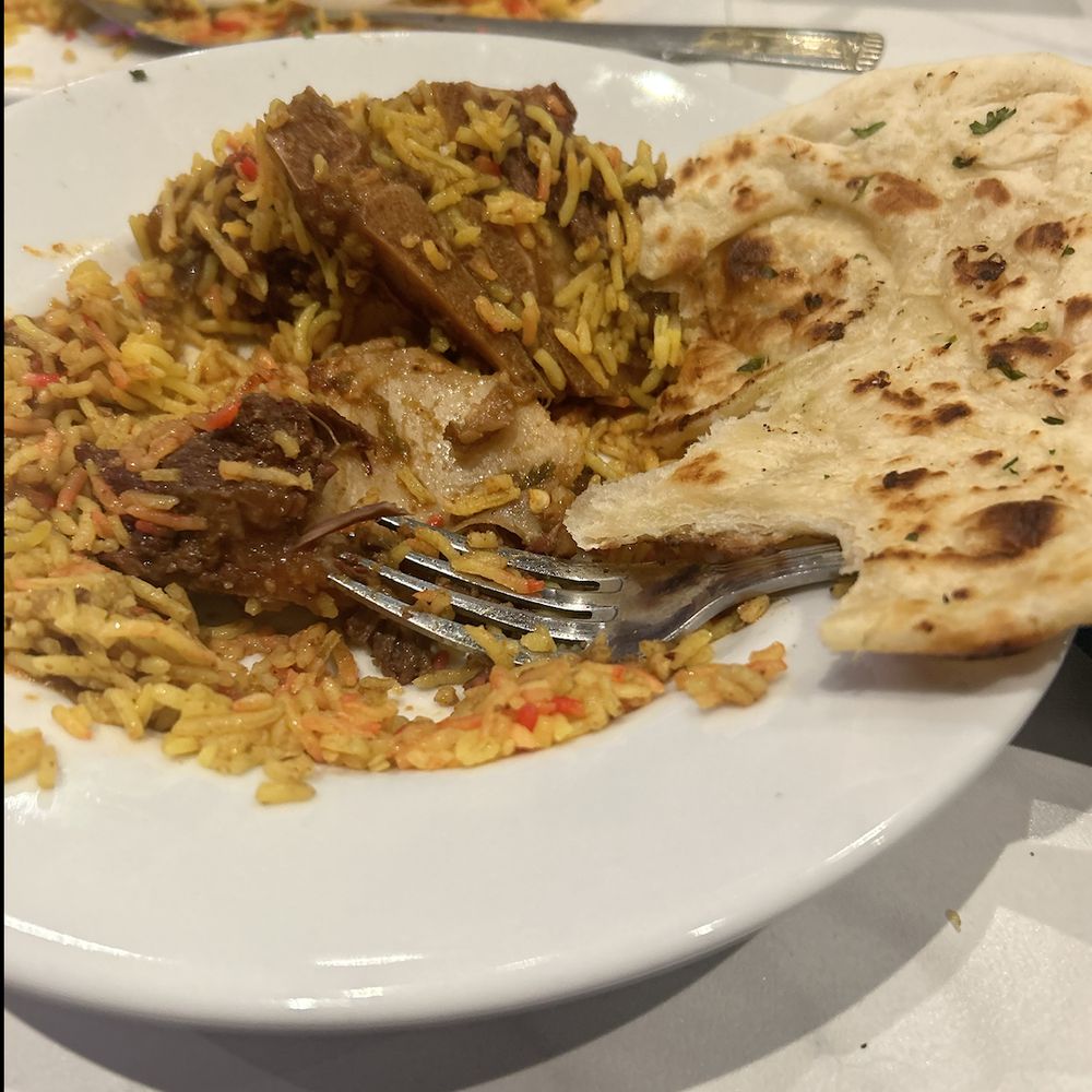 Sofi'z Kitchen & Bar - The Lamb Biriyani and garlic naan - Pakistani Near Me - Chico, California Sofi'z Kitchen & Bar - The Lamb Biriyani and garlic naan - Pakistani Near Me - Chico, California