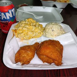 Top Tier Eatery - This is Mac n cheese, potato salad and dark meat chicken.