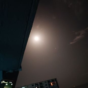 Cape Winds Resort - Rocket launch from fifth floor balcony, didn't photograph well but that is not the moon - Vacation Rentals Near Me - Cape Canaveral, Florida Cape Winds Resort - Rocket launch from fifth floor balcony, didn't photograph well but that is not the moon - Vacation Rentals Near Me - Cape Canaveral, Florida