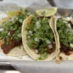 El Fogón Overland Park - Al pastor, chorizo and barbacoa tacos.
