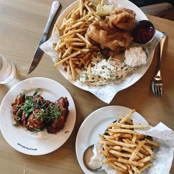 Earls Kitchen + Bar - Finger food... my fave! Korean Wings, Fish + Chips & Truffle Fries - Cocktail Bars Near Me - Plano, Texas