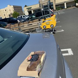 Safeway - My purchase on the back of my car and the storefront.