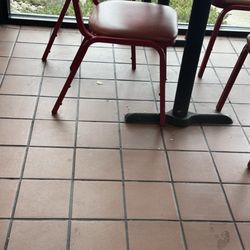 Every table had food on the floor like this one.