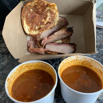 Roots 657 - 3 small strips of brisket, 1/2 full/empty cups of chili. Not pictured was a small mac and cheese. - American Near Me - Leesburg, Virginia Roots 657 - 3 small strips of brisket, 1/2 full/empty cups of chili. Not pictured was a small mac and cheese. - American Near Me - Leesburg, Virginia