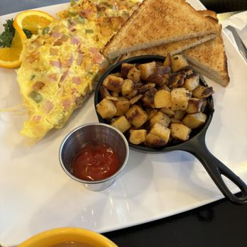 The Yolk Grill - Western Omelette - Waffles Near Me - Nashua, New Hampshire The Yolk Grill - Western Omelette - Waffles Near Me - Nashua, New Hampshire