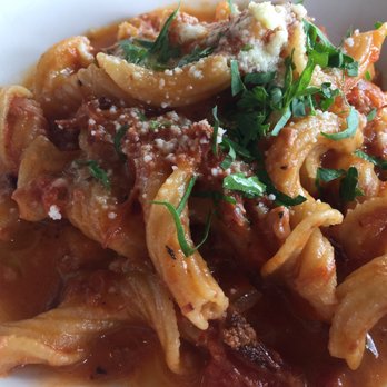 Osteria Tulia - Garganelli- slow braised lamb over homemade pasta (half portion pictured) - Italian Near Me - Naples, Florida Osteria Tulia - Garganelli- slow braised lamb over homemade pasta (half portion pictured) - Italian Near Me - Naples, Florida