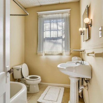 Garza Contractors - Before: one of three ugly bathrooms - General Contractors Near Me - Silver Spring, Maryland