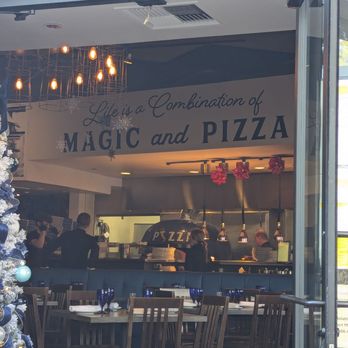 Patricia's Pizza - Looking thru the door.   Life is a combination of Magic and Pizza - Italian Near Me - Scottsdale, Arizona