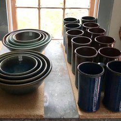 Saltbox Pottery - Nesting bowls and tall mugs catching the light - timeless beauty.