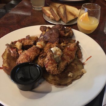 Pat and Gracie's - Brunch - Johnny Cakes, Fried Chicken drizzled in maple syrup, and Potatoes - American Near Me - Columbus, Ohio Pat and Gracie's - Brunch - Johnny Cakes, Fried Chicken drizzled in maple syrup, and Potatoes - American Near Me - Columbus, Ohio