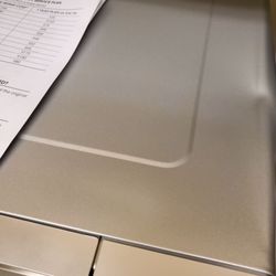 Lowe's Home Improvement - The dent on top of the microwave.