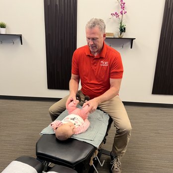 The Joint Chiropractic - Baby adjustment - Chiropractors Near Me - Spanish Fork, Utah The Joint Chiropractic - Baby adjustment - Chiropractors Near Me - Spanish Fork, Utah