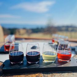 Wolf Gap Vineyard - Experience the joy of a flight while basking in the warmth of the sun and breathing in the crisp, fresh air on our tasting deck!