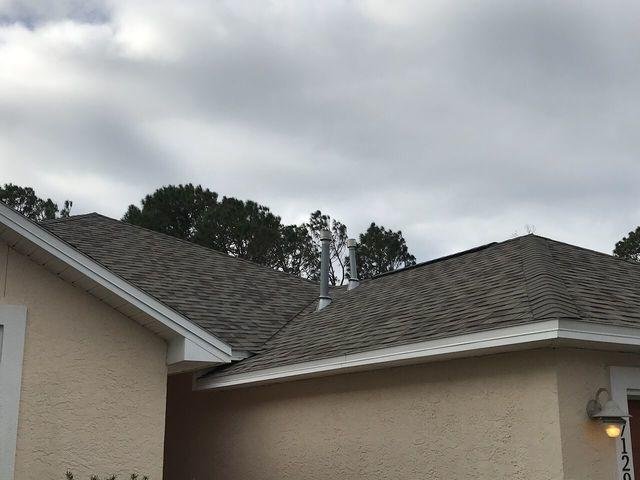 Slide of Alan's Roofing