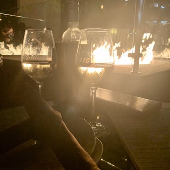 110 Grill - Sitting by the fire - New American Near Me - Manchester, New Hampshire