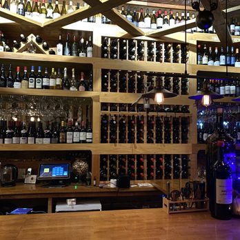 Addictive Wine and Tapas Bar - Inside wine wall - Wine Bars Near Me - East Elmhurst, New York Addictive Wine and Tapas Bar - Inside wine wall - Wine Bars Near Me - East Elmhurst, New York