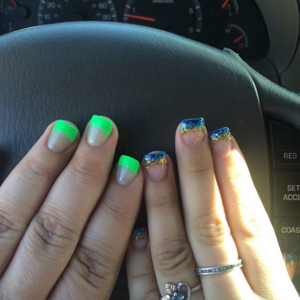 T L Nails - Mine are green and my sisters blue and gold. Great job ladies!!!!! - Nail Salons Near Me - Livermore, California T L Nails - Mine are green and my sisters blue and gold. Great job ladies!!!!! - Nail Salons Near Me - Livermore, California