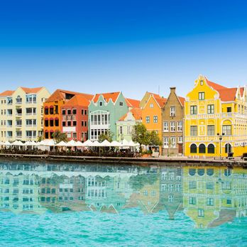 J Lamoglia - Dream Vacations - Explore Willemstad, Curaçao! Stroll Punda & Otrobanda, cross Queen Emma Bridge, and enjoy Dutch-Caribbean charm. Book your getaway! - Travel Agents Near Me J Lamoglia - Dream Vacations - Explore Willemstad, Curaçao! Stroll Punda & Otrobanda, cross Queen Emma Bridge, and enjoy Dutch-Caribbean charm. Book your getaway! - Travel Agents Near Me