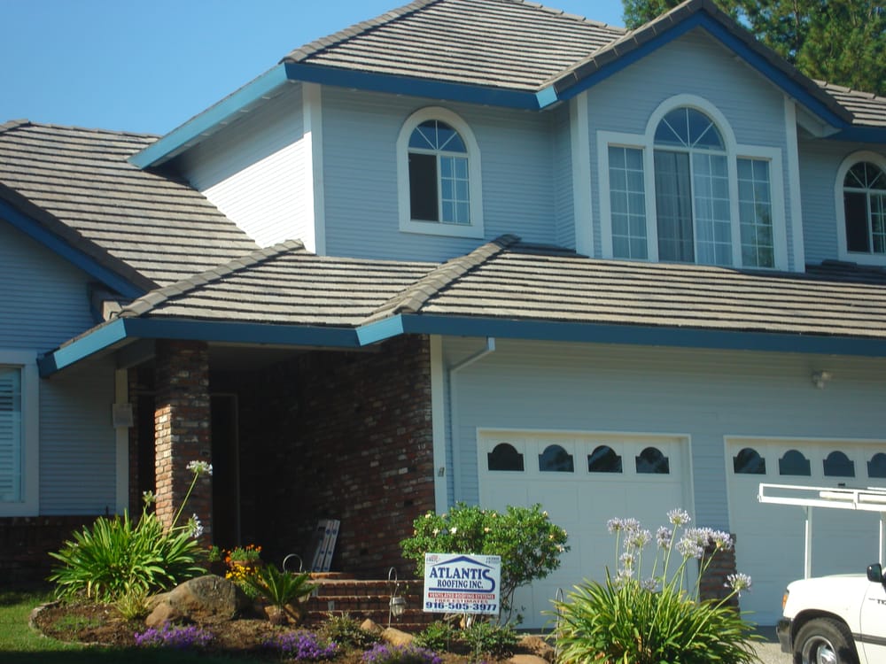 Slide of Atlantis Roofing