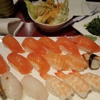 Sake Sushi - Sushi: Salmon, eel, scallops, white tuna and shrimp Seaweed salad in the back - Sushi Bars Near Me - Brooklyn, New York Sake Sushi - Sushi: Salmon, eel, scallops, white tuna and shrimp Seaweed salad in the back - Sushi Bars Near Me - Brooklyn, New York