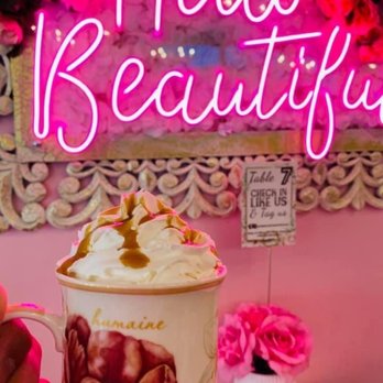 Mrs Coco - This is the caramel macchiato... full of syrup and like butter coffee, the coffee is only 40 percent paying $$ .. cute background though - Cafes Near Me - Henderson, Nevada