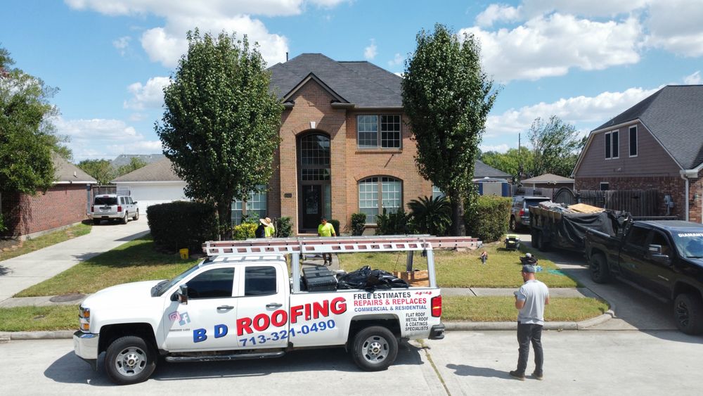 Slide of BD Commercial Roofing