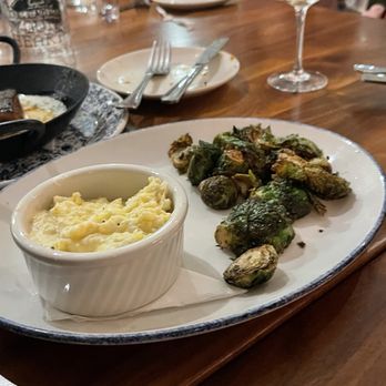 Tupelo Honey Southern Kitchen & Bar - Goat cheese grits and sprouts - Southern Near Me - Franklin, Tennessee Tupelo Honey Southern Kitchen & Bar - Goat cheese grits and sprouts - Southern Near Me - Franklin, Tennessee