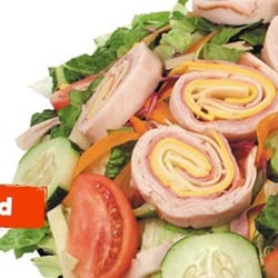 Chef Salad - Smoked turkey breast, ham, hard-boiled egg, cheddar cheese, served on top of our tossed green salad