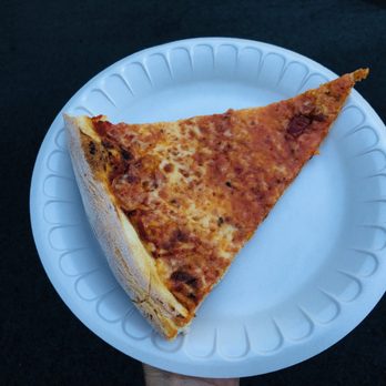 Amici's Pizzeria - a slice of pizza on a paper plate - Pizza Near Me - North Andover, Massachusetts