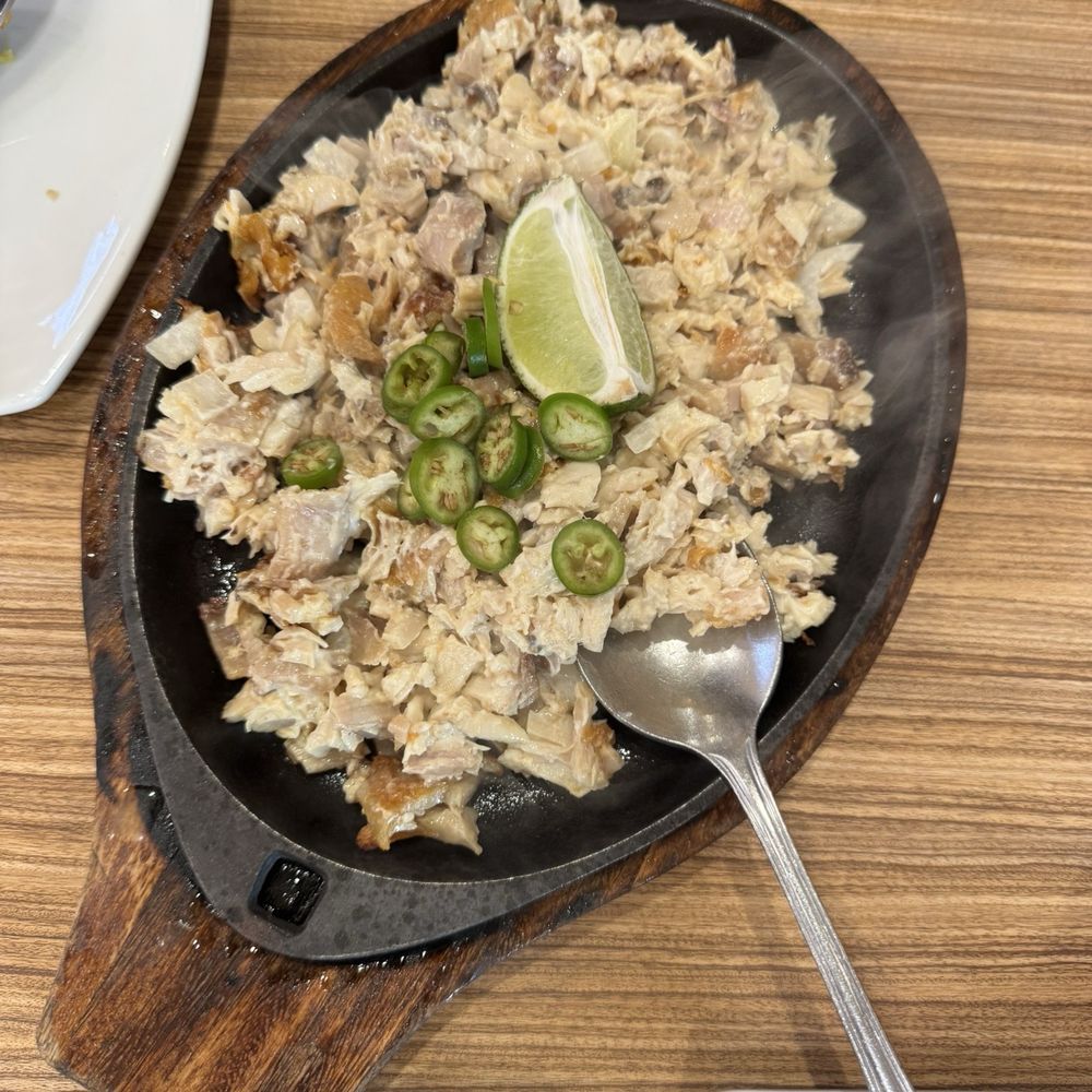 Chicken Sisig (crispy chicken with aromatics) Chicken Sisig (crispy chicken with aromatics)